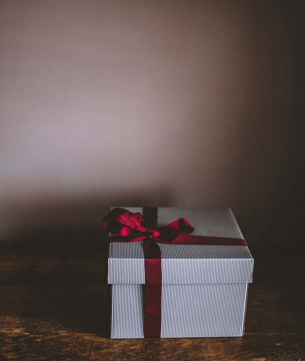 Giving the gift of evaluation. Photo by  Annie Spratt  on  Unsplash
