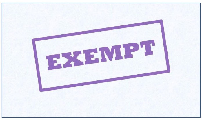 The word "exempt" appears in purple, capital letters, with a purple rectangular border around it and a white background. It's in the style of something stamped onto a piece of paper. 